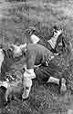 c1946 tending fire